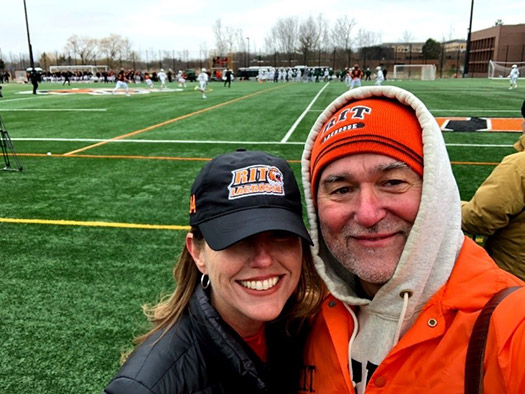 Dave and wife Lisa attending an RIT lacrosse game